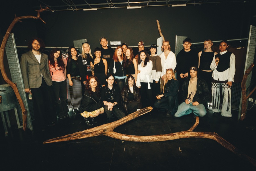 The Feierabend team posing with the decorative wood set