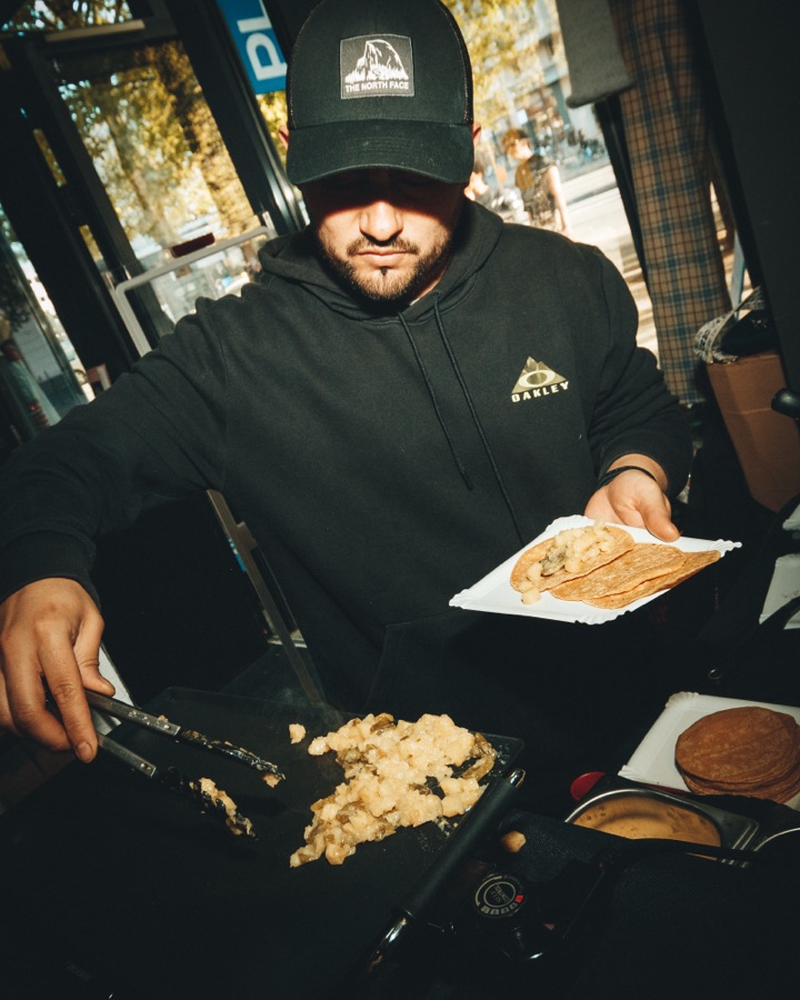 Chef serving food to guests